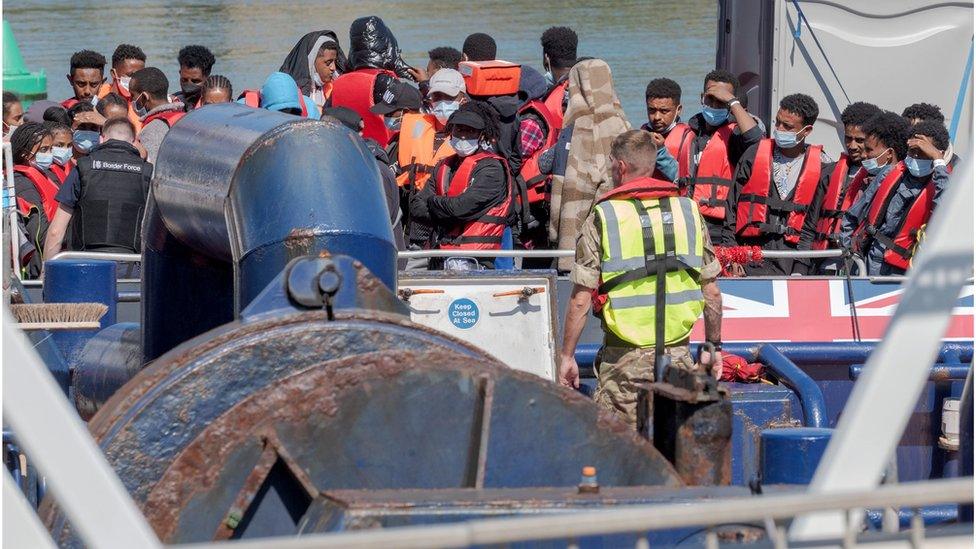 UK Border Force bring migrants into Dover