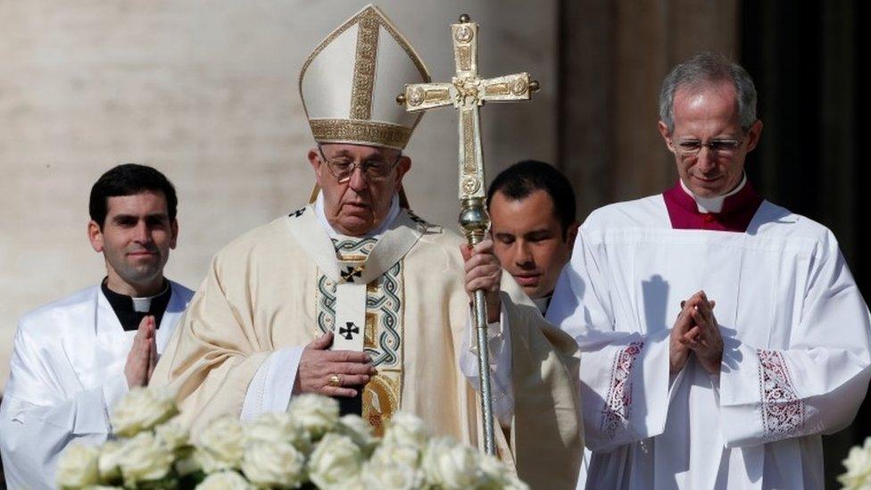 Pope Francis arrives to lead the Easter Mass at St Peter's Square at the Vatican April 1, 2018