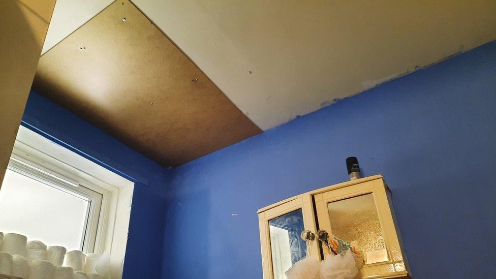 Katie Hood's bathroom ceiling which has been boarded up