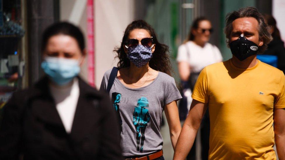 People wearing masks on the street