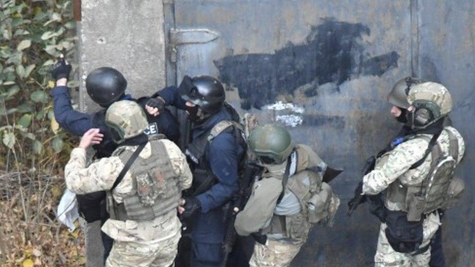 Members of Georgian security forces at the scene of the stand-off in Tbilisi (22 Novemnber 2017)