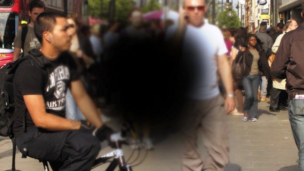 Patient's-eye view of a busy city street