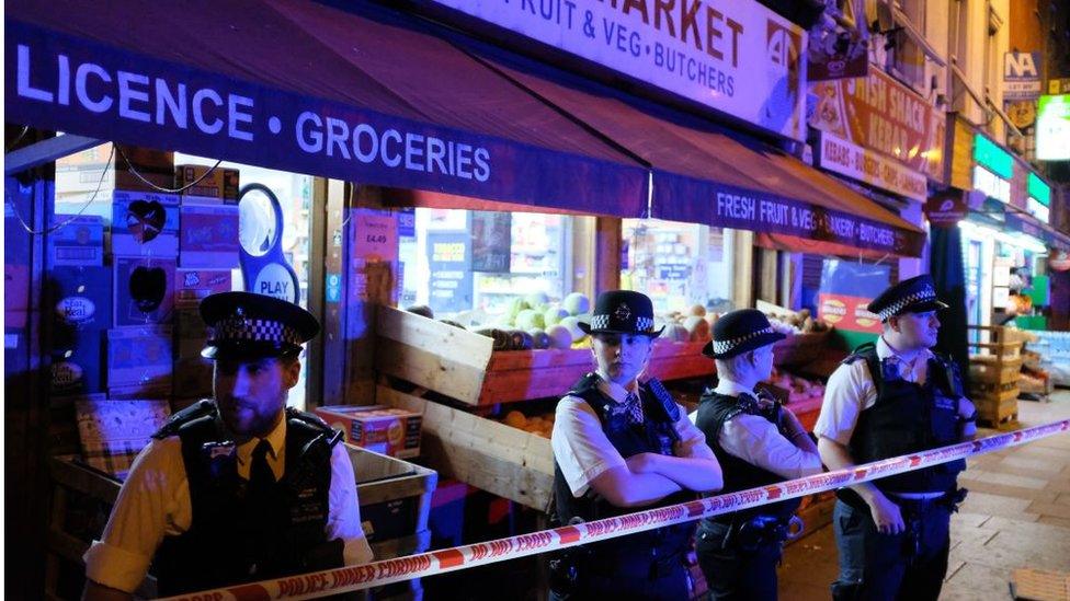 Police cordon off a street in the Finsbury Park area of north London after a vehicle hit pedestrians, on June 19, 2017