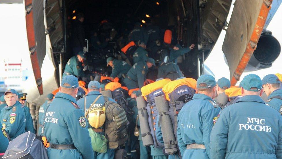 Novosibirsk specialists boarding transport plane, 4 Jun 20