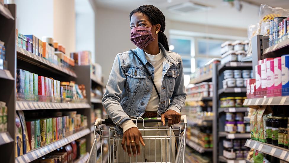 Woman shopping with face mask on