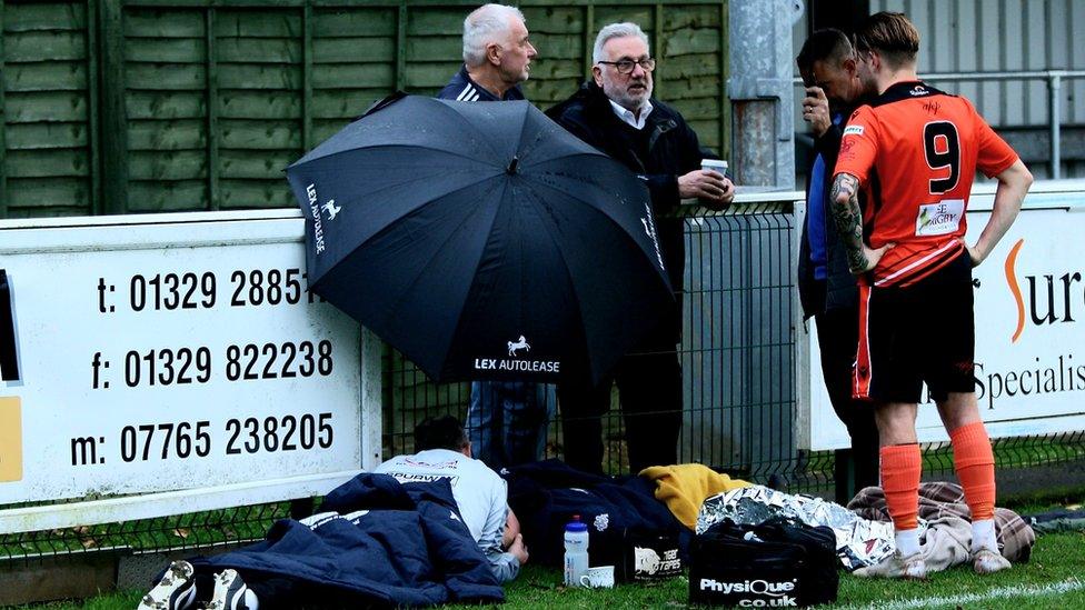 footballer on ground