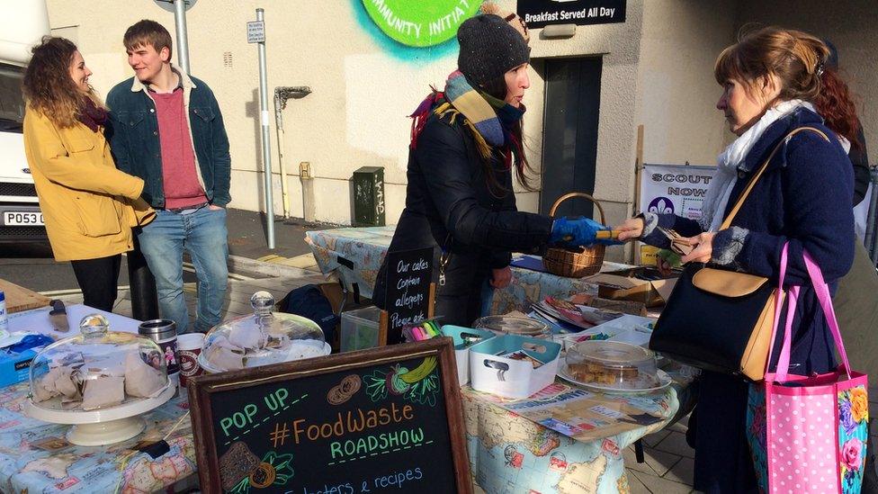 Lia Moutselou handing out cake samples