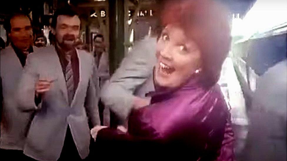 Cilla Black singing.