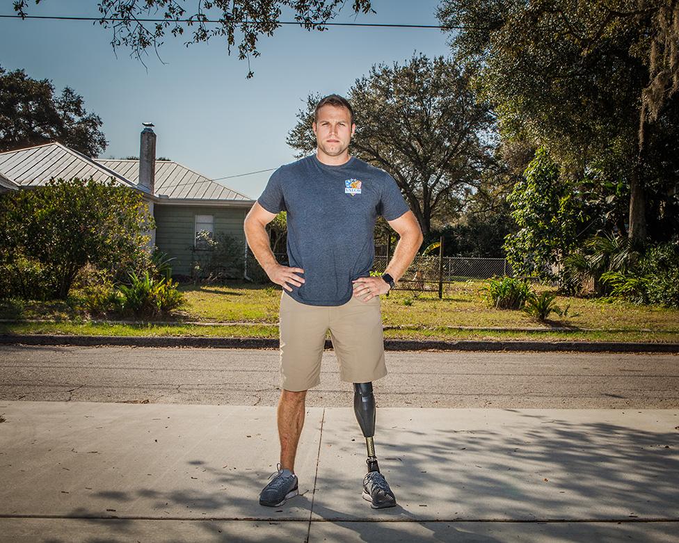 Justin Lansford standing on a pavement