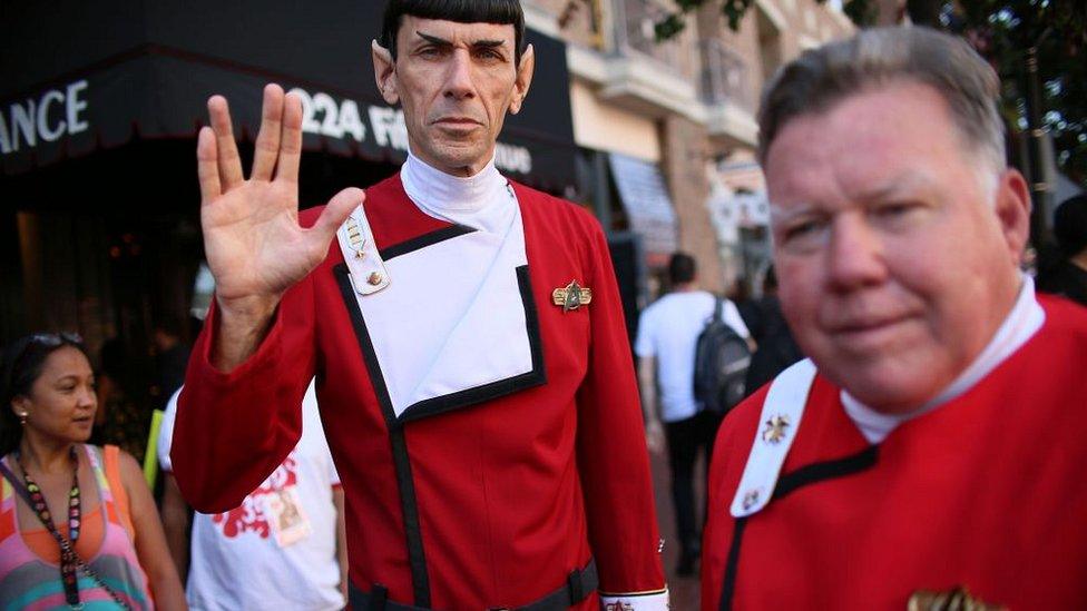 Cosplay characters dressed as Mr Spock and Captain Kirk from Star Trek along 5th Ave. across from the San Diego Convention Center during Comic Con International in San Diego, California