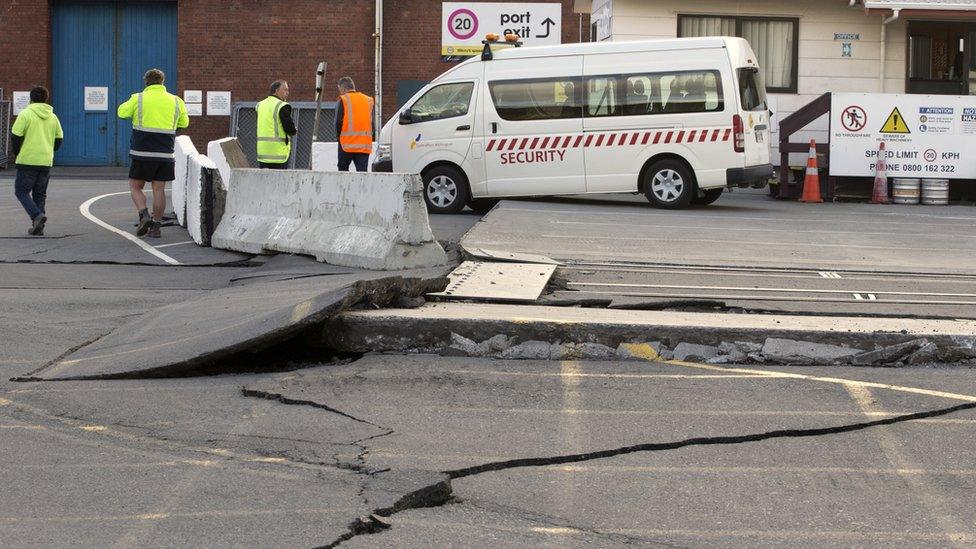 A paved road is lifted at the ports in Wellington, New Zealand, Monday, Nov. 14, 2016, following an earthquake