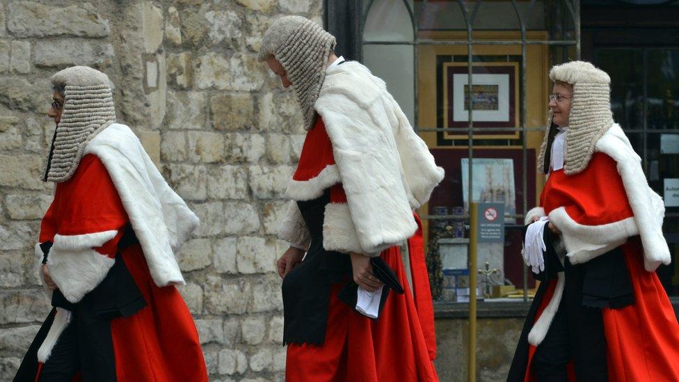 Three judges walking