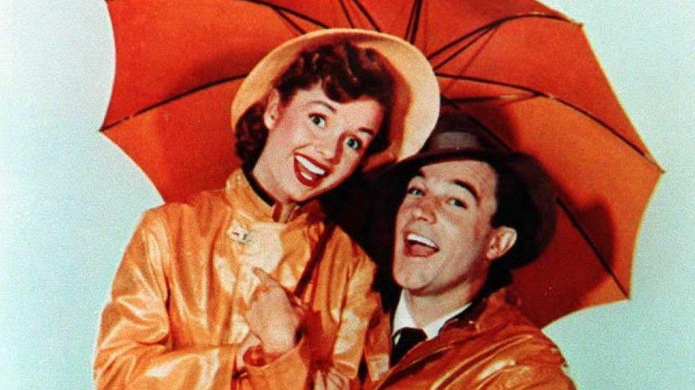 Photo of Gene Kelly and Debbie Reynolds in the 1952 film Singin' in the Rain