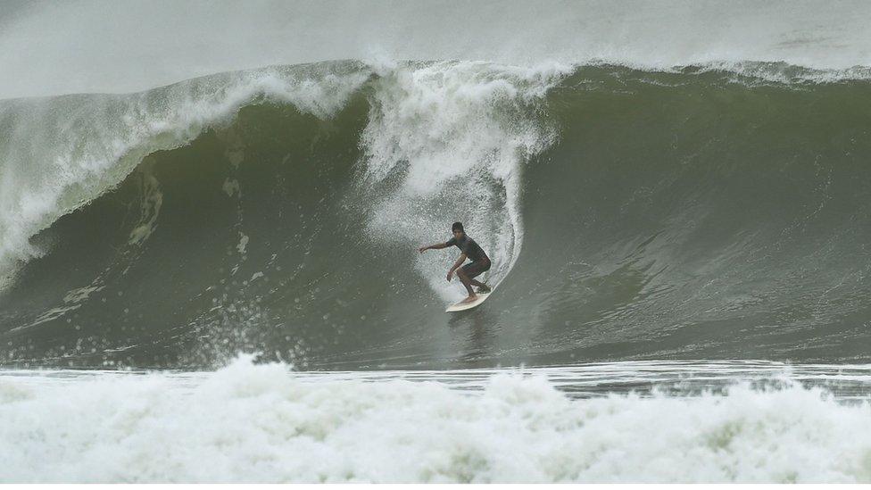 a surfer on a wave, June 6 2016