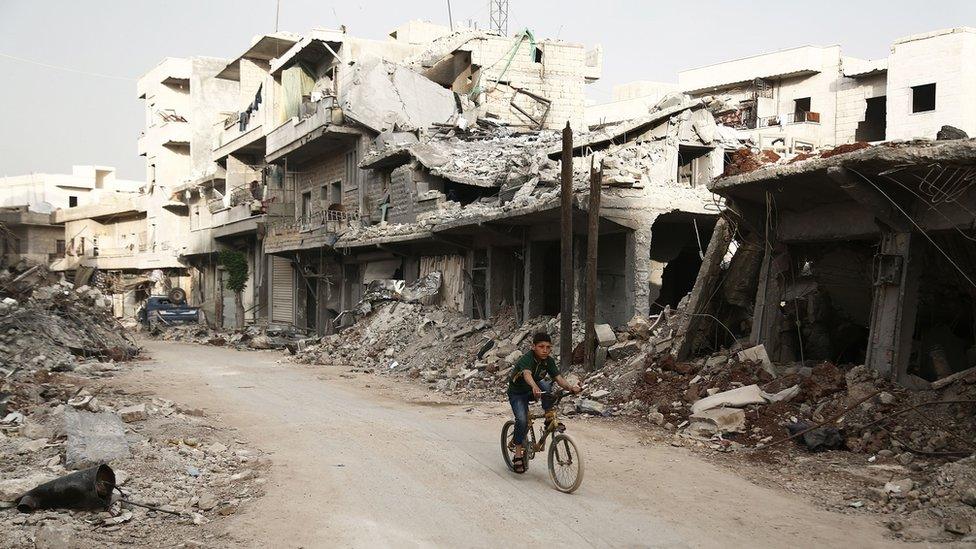 Damaged buildings in Afrin, Syria