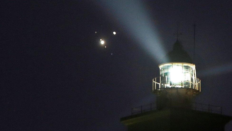 View of the conjunction of Saturn and Jupiter in the sky over Santa Pola, Alicante, eastern Spain