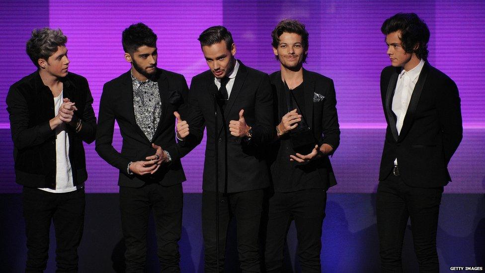 1D at the 2013 America Music Awards accepting their award for favourite pop/rock album for 'Take Me Home'