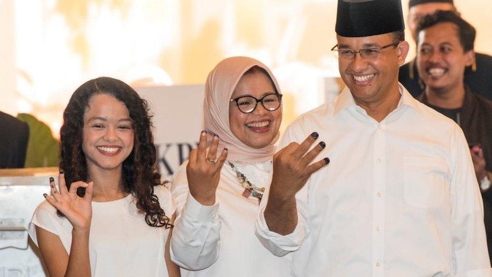 Anies Baswedan and his family vote in Jakarta (16 Feb 2017)