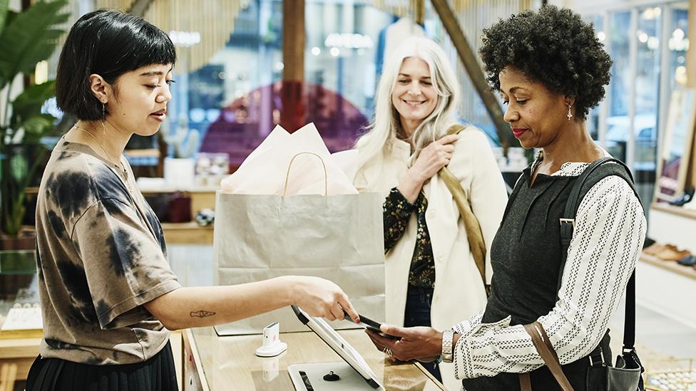 Person paying for goods