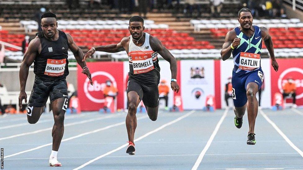 Kenya's Ferdinand Omurwa Omanyala (left) breaking the African 100m record finishing behind Trayvon Bromell (centre) but ahead of Justin Gatlin