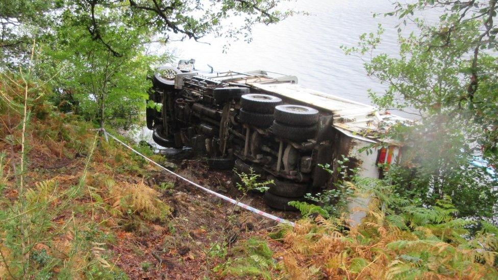 Bin lorry on its side by Ullswater