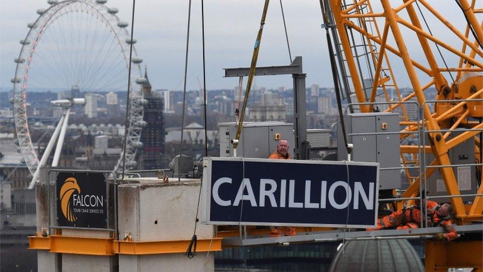 Carillion sign being taken down