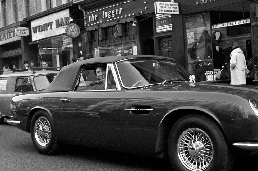 Prince of Wales at the wheel of his Aston Martin