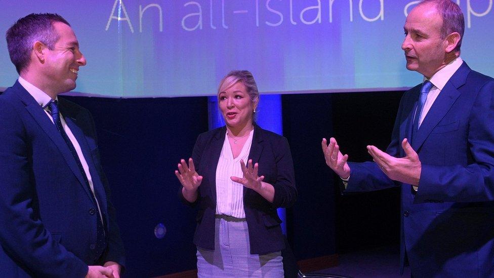 Taoiseach Micheál Martin, with First Minister Paul Givan and Deputy First Minister Michelle O'Neill, at a climate conference at the SSE Arena Belfast on 8 October 2021