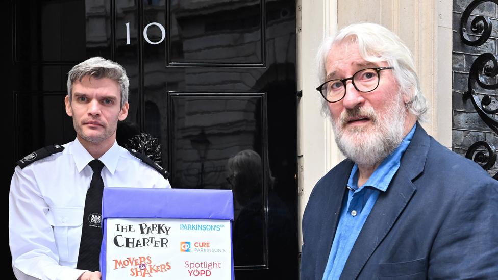 Jeremy Paxman presenting the Parky Charter at No 10