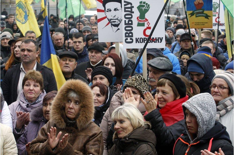 Supporters of Ukraine's political party Ukrop protest in front of the Parliament in Kiev on November 3, 2015 against the detention of their leader Guennadi Korban. Korban, 45, a businessman close to the former governor of the eastern region of Dnipropetrovsk Igor Kolomoyski, was arrested on October 31 as part of a crackdown on corruption and organised crime, authorities said