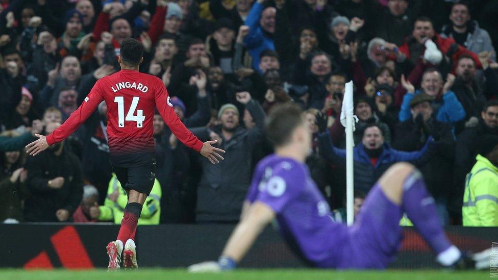 Lingard celebrating to the crowds.