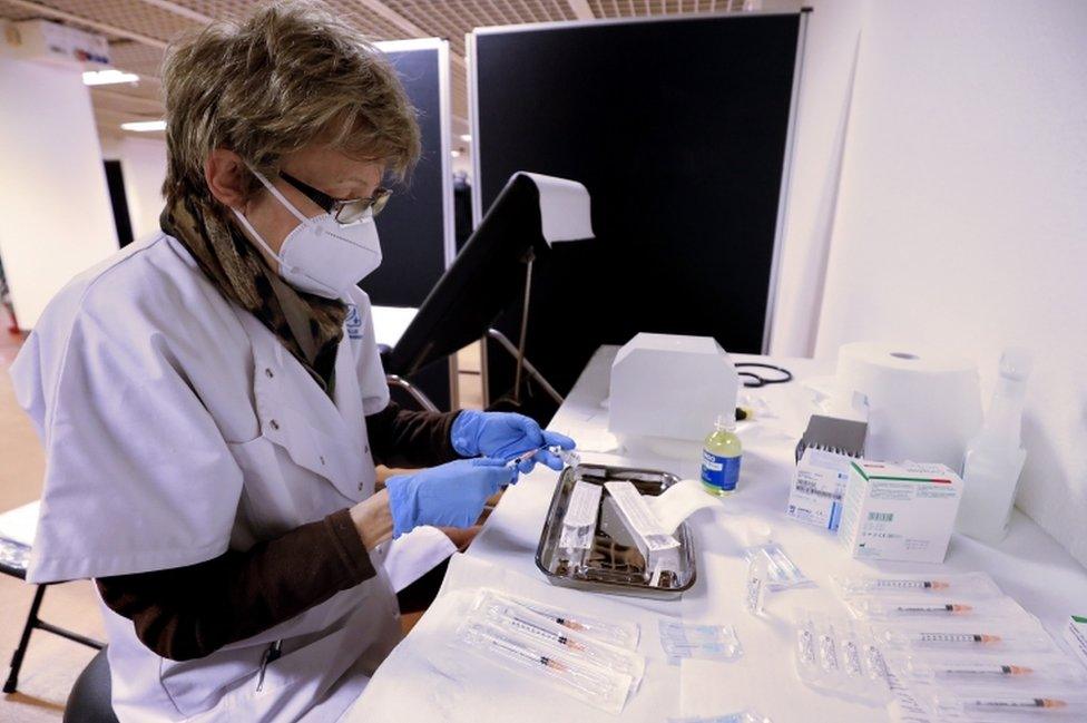 A nurse prepares a dose of the Pfizer-BioNTech COVID-19 vaccine in Cannes, France, 09 January 2021.