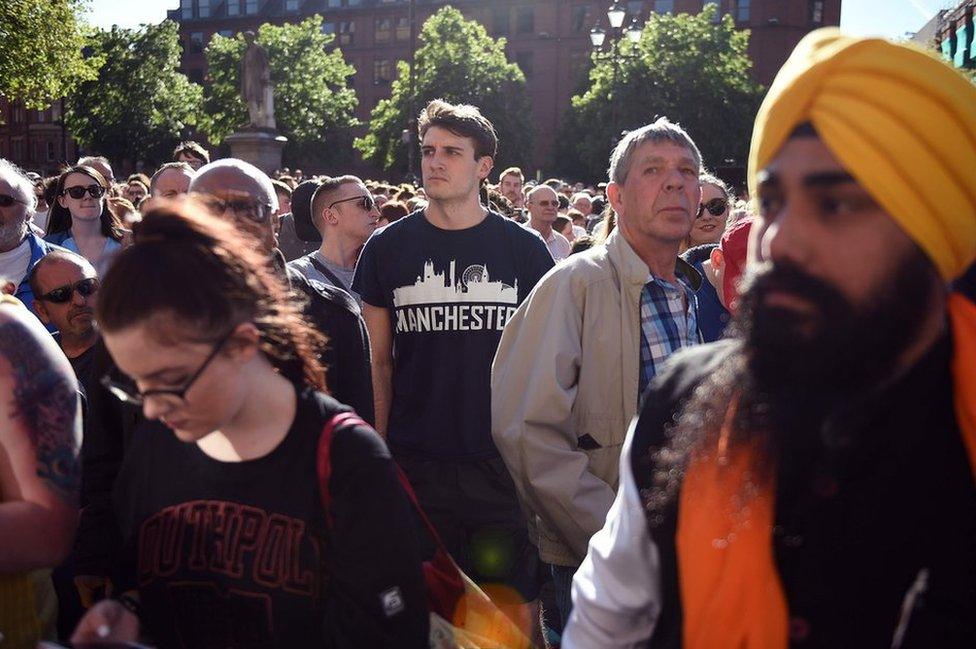 People congregate to attend a vigil in Albert Square in Manchester, northwest England on 23 May, 2017