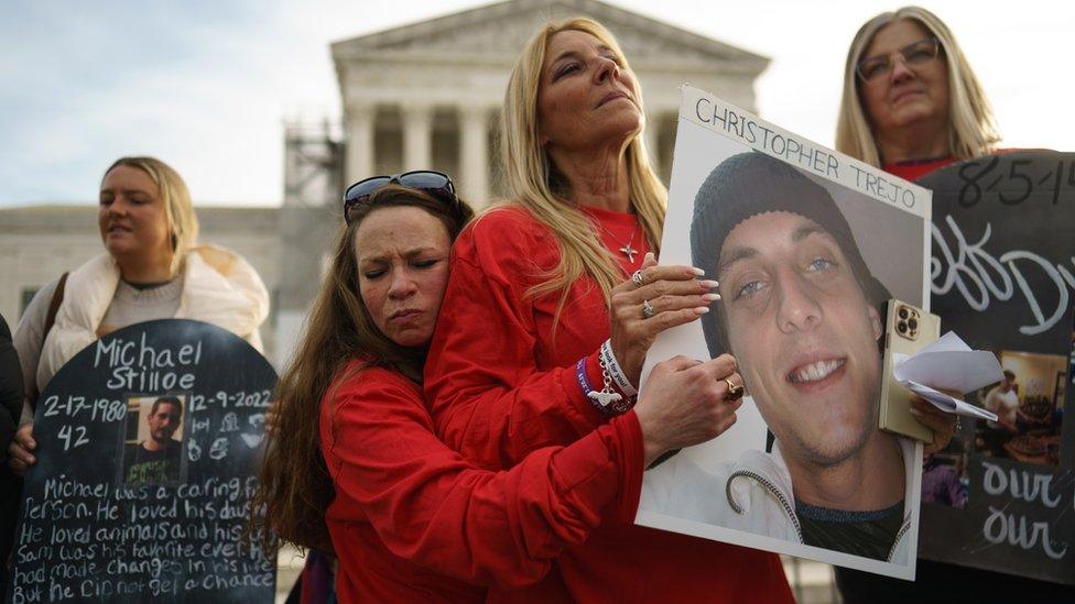 Demonstrators outside the Supreme Court on Monday