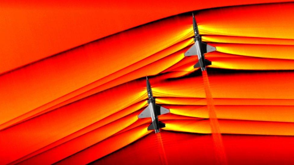 Photo of the supersonic waves of two aircraft.