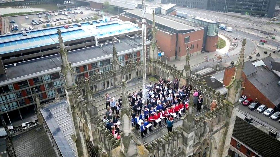 Aerial picture of children on roof