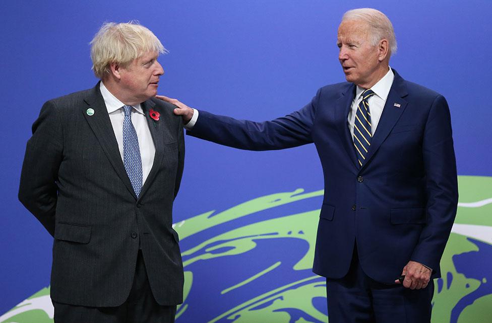 British Prime Minister Boris Johnson greets US President Joe Biden at the COP26 UN Climate Change Conference in Glasgow on 1 November 2021