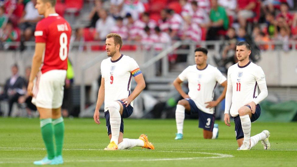 England players taking the knee