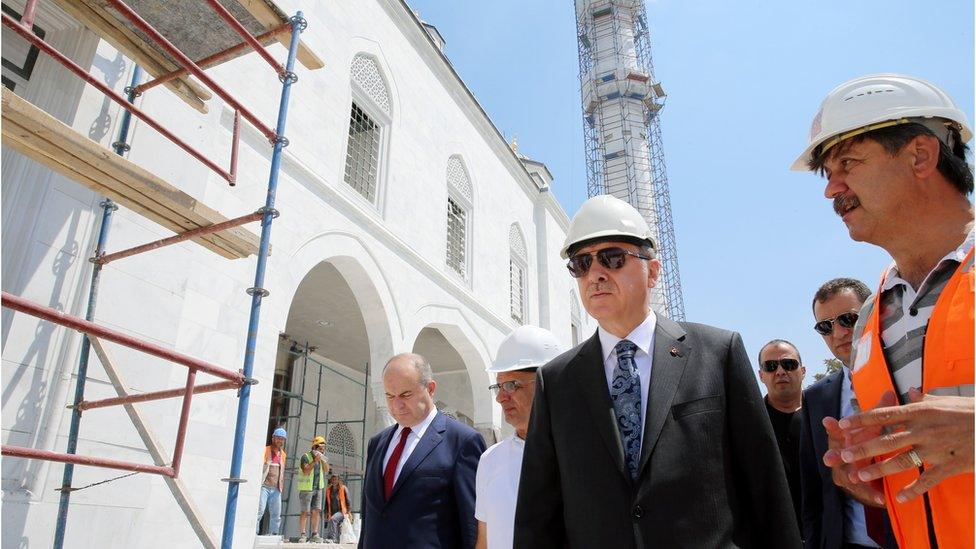 Turkish President Recep Tayyip Erdogan (C) visits the construction site of Ottoman Mosque in Ankara, Turkey on July 28, 2016