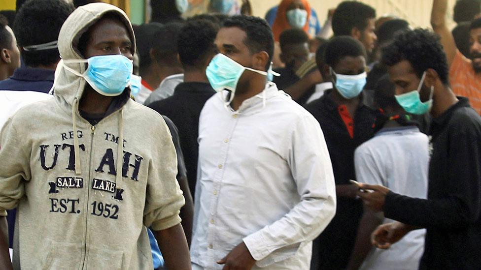 Sudanese demonstrators gather as they participate in anti-government protests in Khartoum, Sudan -17 January 2019