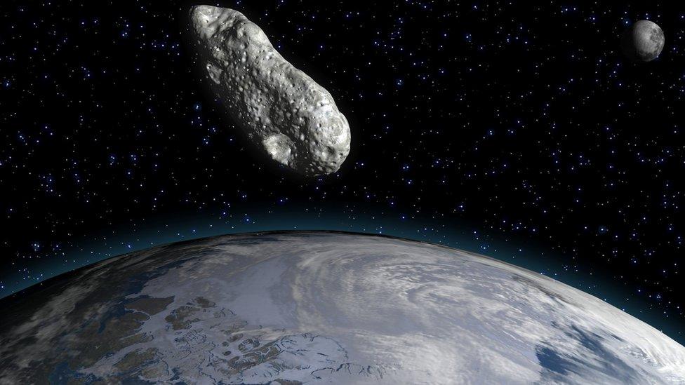 An artists impression of an asteroid near Earth