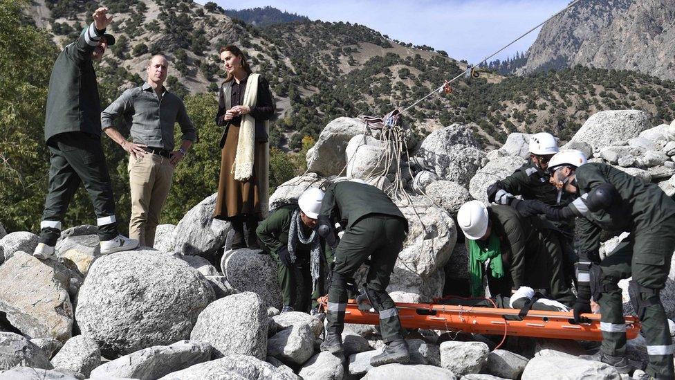 The Duke and Duchess of Cambridge meet an emergency response team in the village of Bumburet