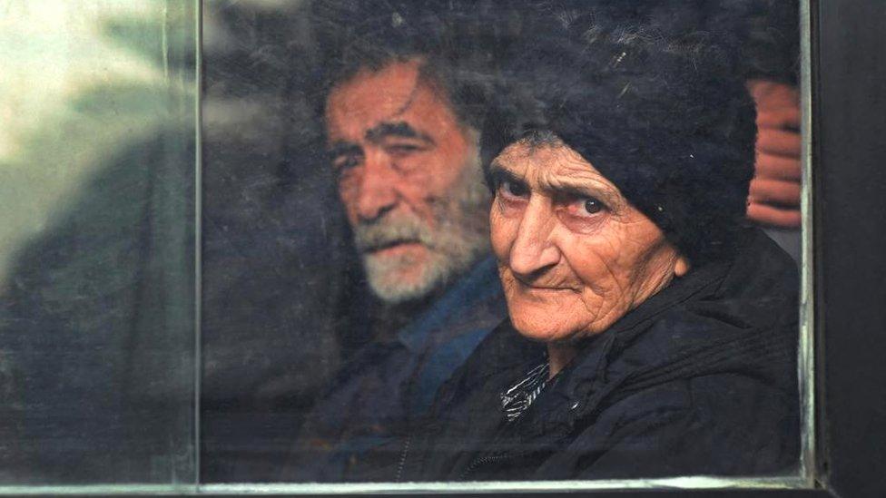 people in a bus waiting to leave Stepanakert