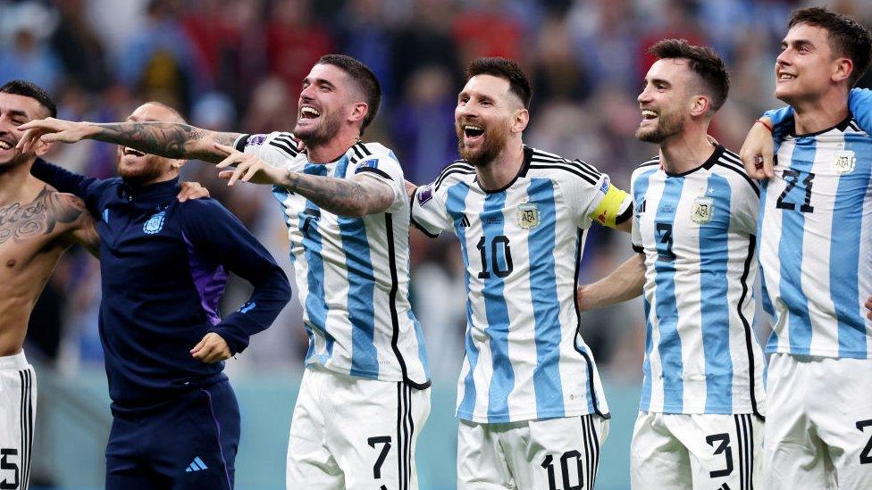 Messi Rodrigo De Paul, Lionel Messi, Nicolas Tagliafico and Paulo Dybala of Argentina celebrate after the team's victory during the FIFA World Cup Qatar 2022 semi final match