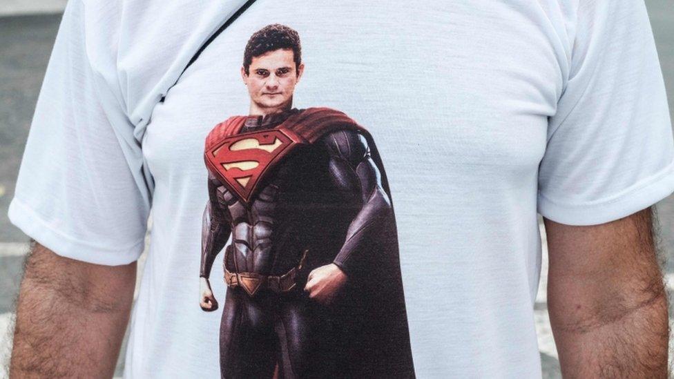 Rio anti-corruption march: demonstrator wears T-shirt depicting Prosecutor Sergio Moro as Superman