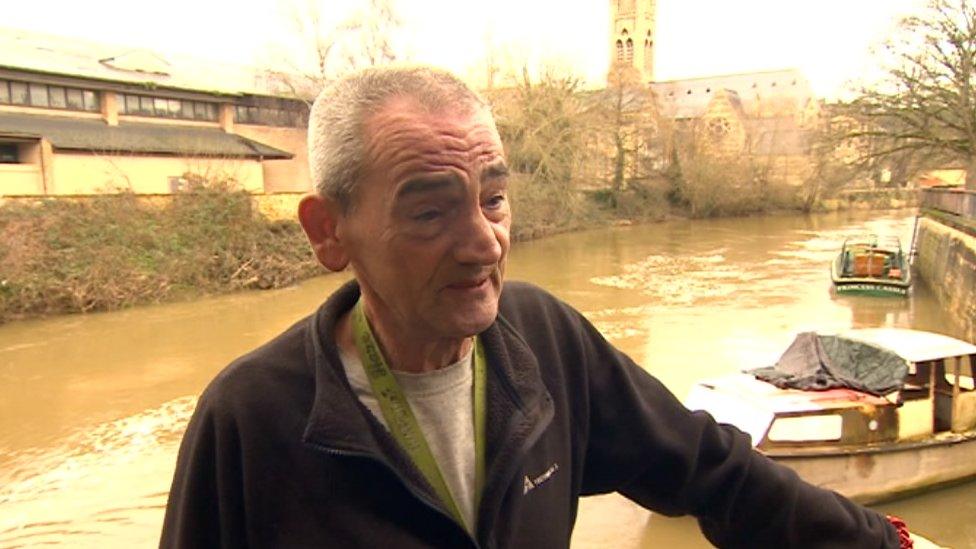 Gary Braund stands in front of the river