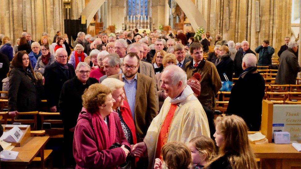 The Archbishop greeting people