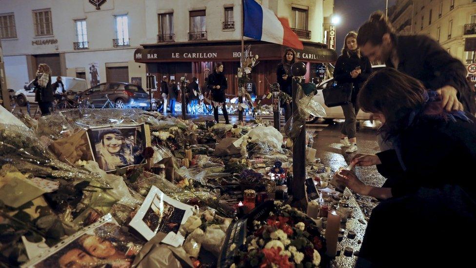 Candles near the site of last Friday's attack at Le Carillon cafe in Paris. 19, November 2015