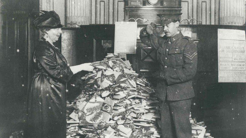 Lady Florence Boot presenting a gift to a wounded soldier