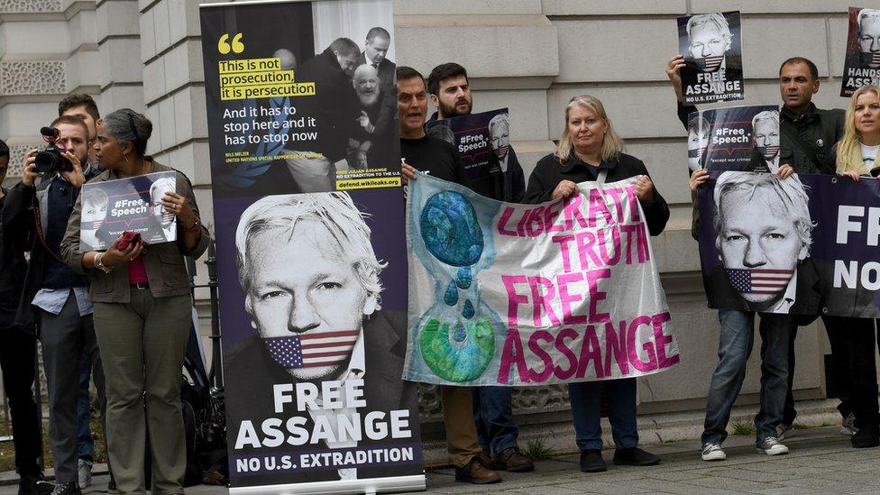 A group of protesters outside Westminster Magistrates' Court